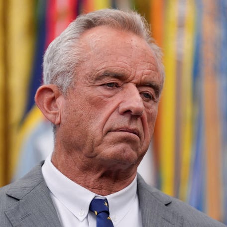 Health and Human Services Secretary Robert F. Kennedy Jr. looks on as President Donald Trump makes an announcement about lowering U.S. drug prices, at the White House in Washington, D.C., October 10, 2025.