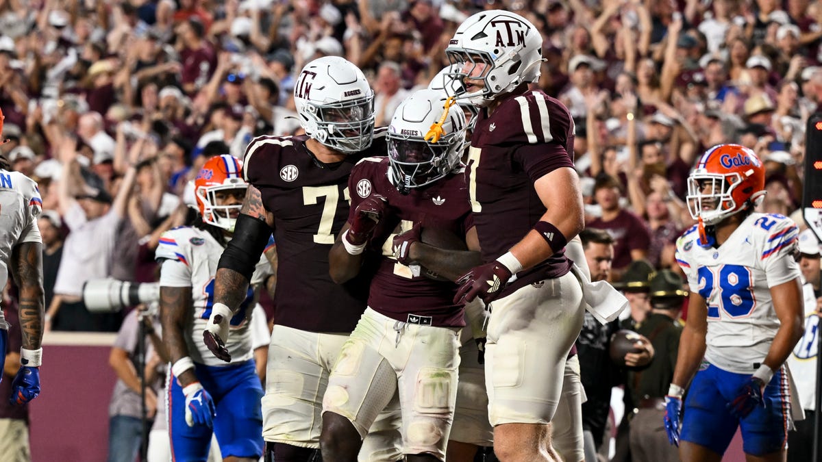 Texas A&M running back Rueben Owens II (4) celebrates his touchdown with teammates during the fourth quarter against Florida at Kyle Field.