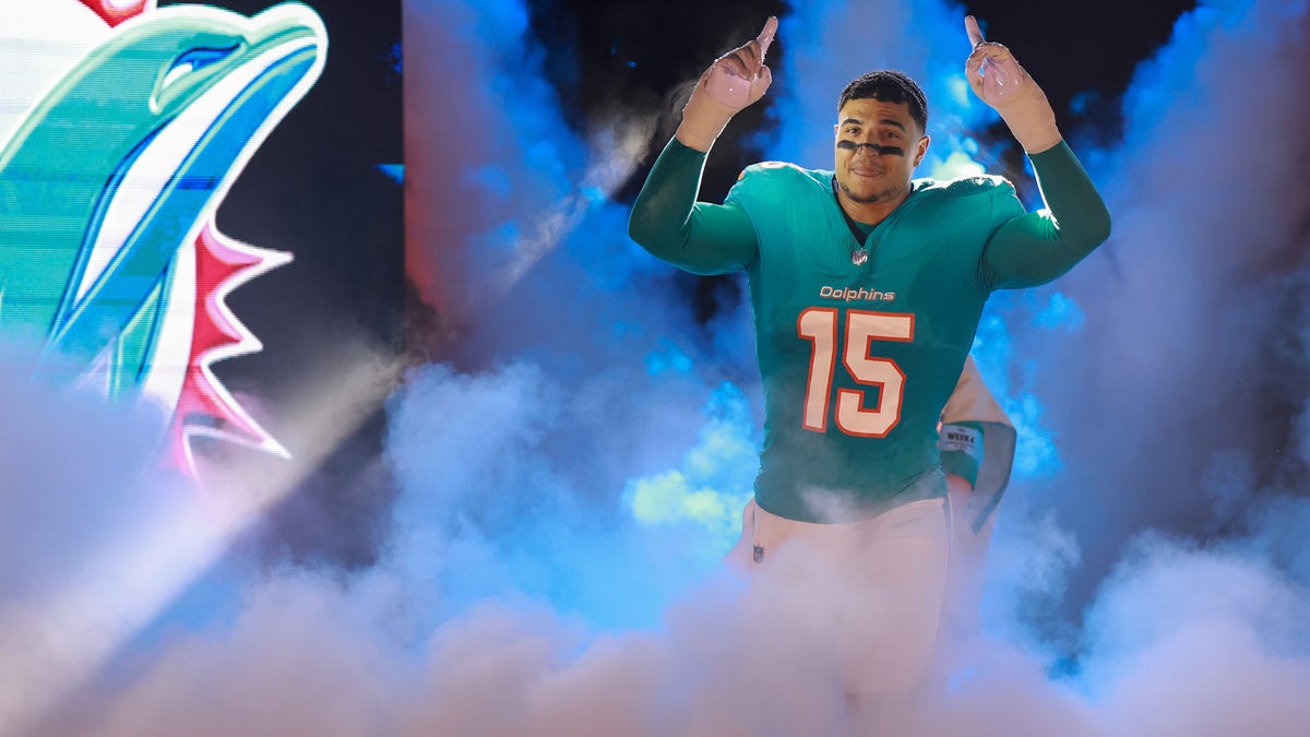 Jaelan Phillips #15 of the Miami Dolphins takes the field before playing the Tennessee Titans at Hard Rock Stadium on September 30, 2024 in Miami Gardens, Florida.