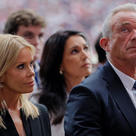 U.S. Health and Human Services Secretary Robert F. Kennedy Jr. and his wife actor Cheryl Hines attend the memorial service for slain conservative commentator Charlie Kirk at State Farm Stadium in Glendale, Arizona, on Sept. 21, 2025.
