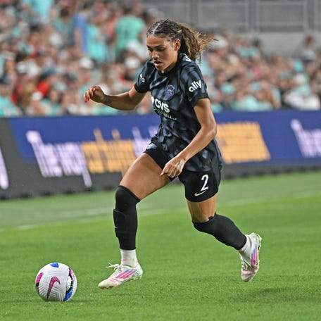 Washington Spirit forward Trinity Rodman (2) dribbles the ball in the second half against the Kansas City Current at CPKC Stadium.