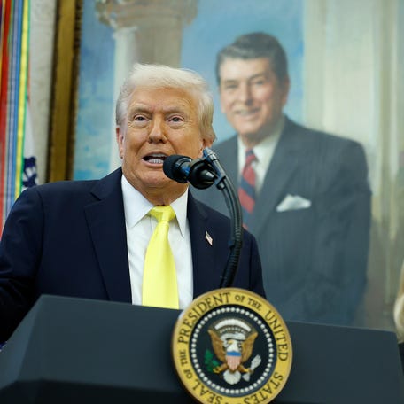 President Donald Trump speaks U.S. Attorney General Pam Bondi look on during a press conference in the Oval Office of the White House on October 15, 2025 in Washington, DC.
