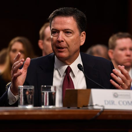 Former FBI Director James Comey testifies in 2017 in front of the Senate Intelligence Committee in Washington, DC.