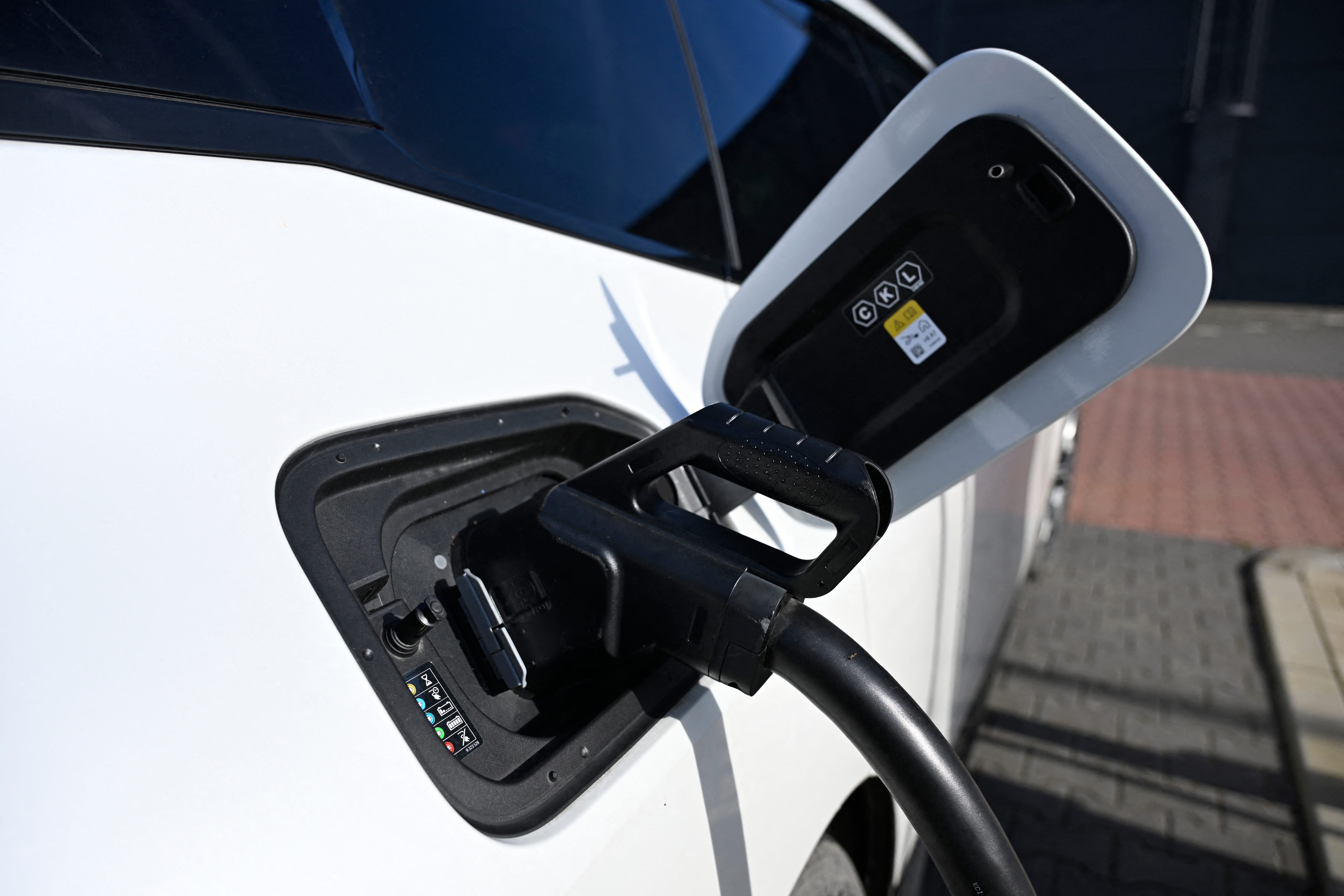 Gas prices have drivers considering hybrids and EVs. Should you?