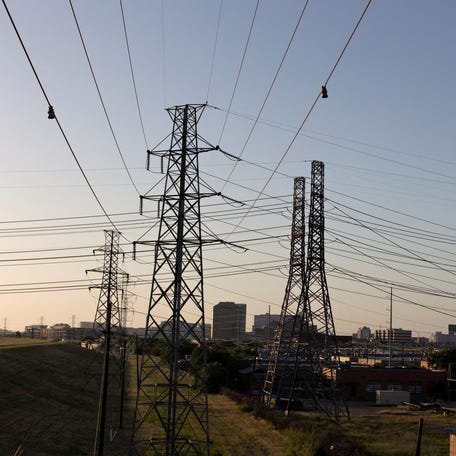 Power lines are seen during a heatwave with expected temperatures of 102 F (39 C) in Dallas, Texas, U.S. June 12, 2022.
