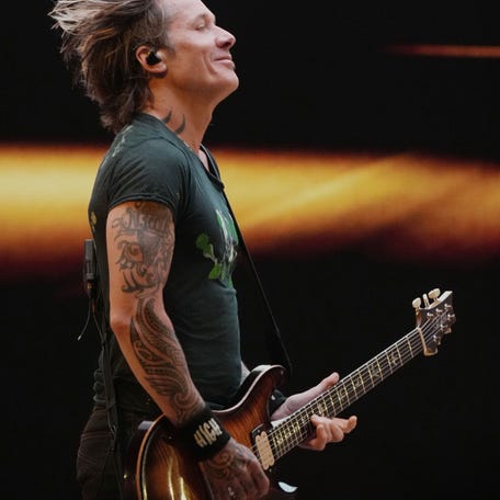 Keith Urban performs during the HIGH AND ALIVE WORLD TOUR at Bridgestone Arena Friday Oct. 17, 2025, in Nashville, TN.