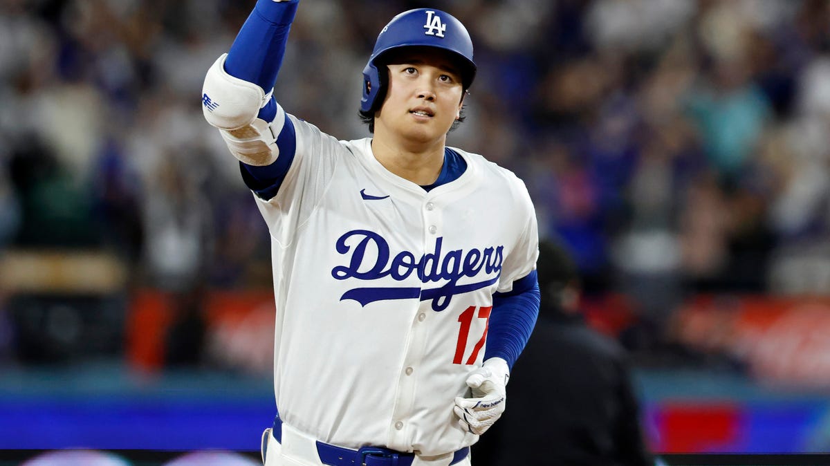 LOS ANGELES, CALIFORNIA - OCTOBER 17: Shohei Ohtani #17 of the Los Angeles Dodgers reacts as he runs the bases after hitting his third home run of the game in the seventh inning against the Milwaukee Brewers in game four of the National League Championship Series at Dodger Stadium on October 17, 2025 in Los Angeles, California. (Photo by Ronald Martinez/Getty Images)