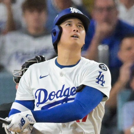 Shohei Ohtani watches his second home run in Game 4.