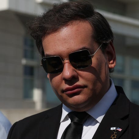 Former Rep. George Santos, R-New York, leaves the court after pleading guilty in Central Islip on Aug. 19, 2024. Santos was expelled from the U.S. House of Representatives on Dec. 1, 2023, for filing false or incomplete reports with the Federal Election Commission, using campaign funds for personal purposes, engaging in fraudulent conduct, and engaging in violations of the Ethics in Government Act. Convicted on April 25, 2025, of   wire fraud and aggravated identity theft, Santos was sentenced to 87 months in prison and ordered to pay restitution to his victims in the amount of $373,749.97 and $205,002.97 in forfeiture.