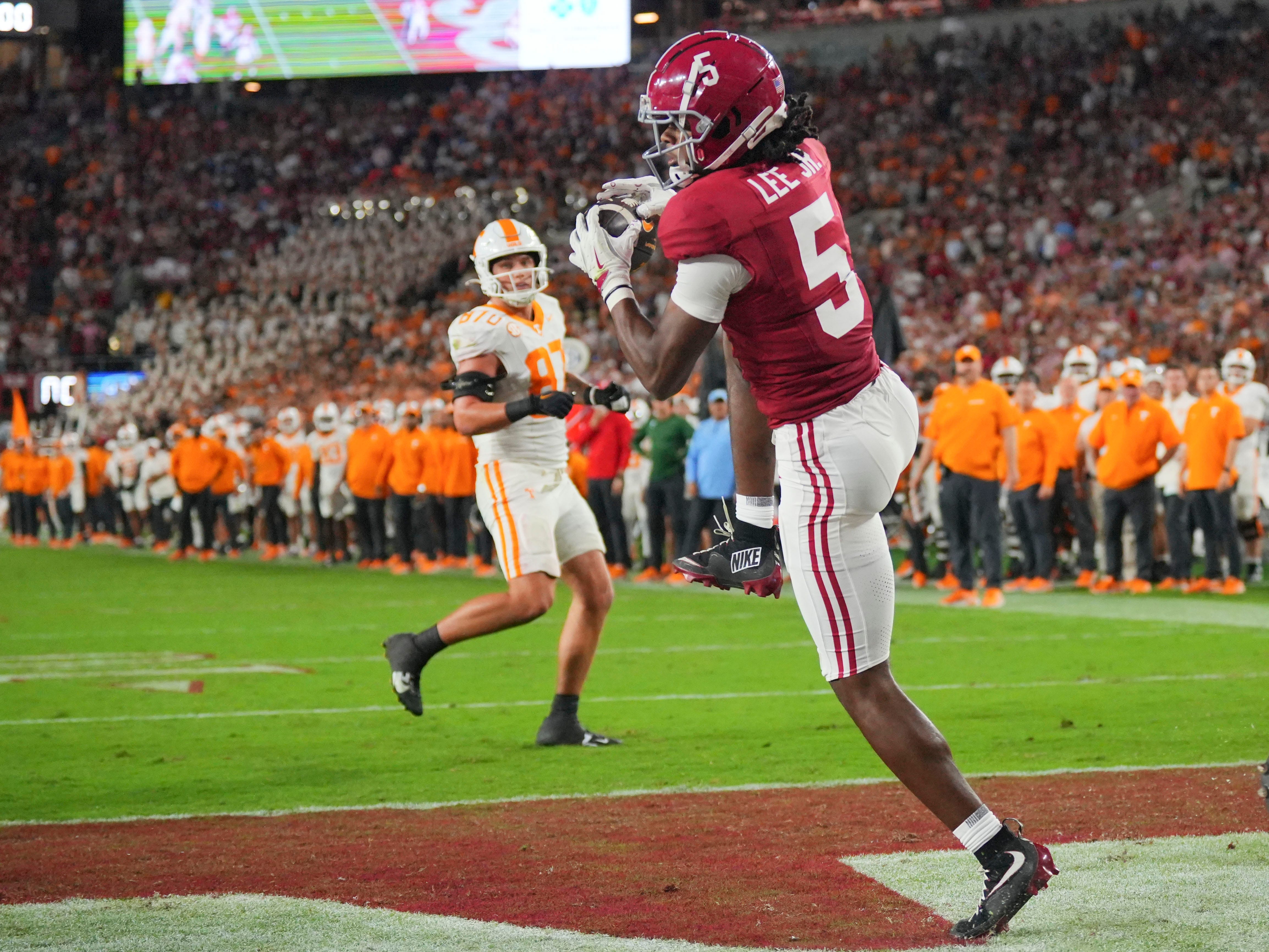 Alabama defensive back Dijon Lee Jr. (5) intercepts a Tennessee pass on a 2-point conversion during a college football game at Bryant-Denny Stadium in Tuscaloosa, Ala., on Oct. 18, 2025.