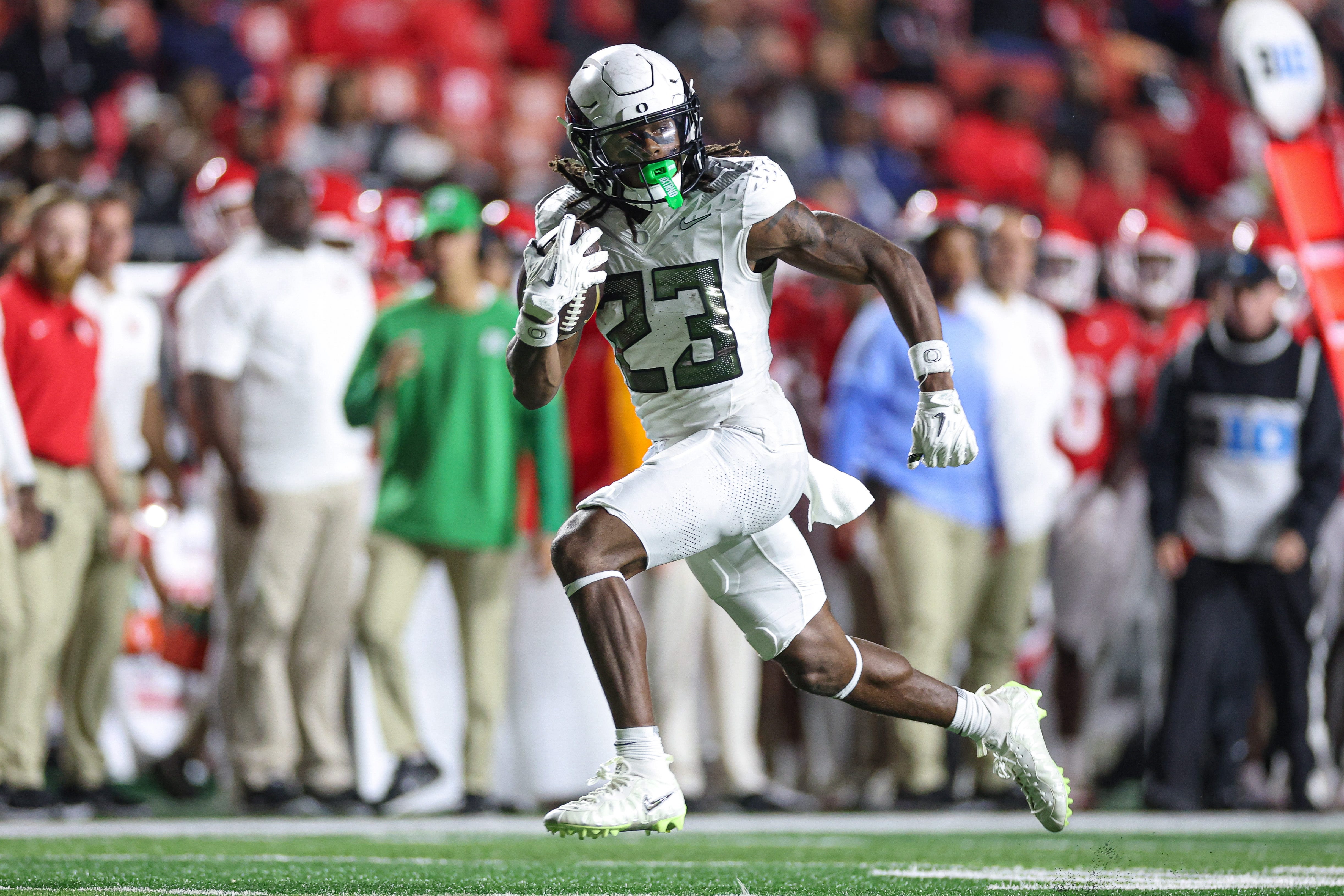 Oct 18, 2025; Piscataway, New Jersey, USA; Oregon Ducks running back Dierre Hill Jr. (23) carries the ball against the Rutgers Scarlet Knights during the second half at SHI Stadium.