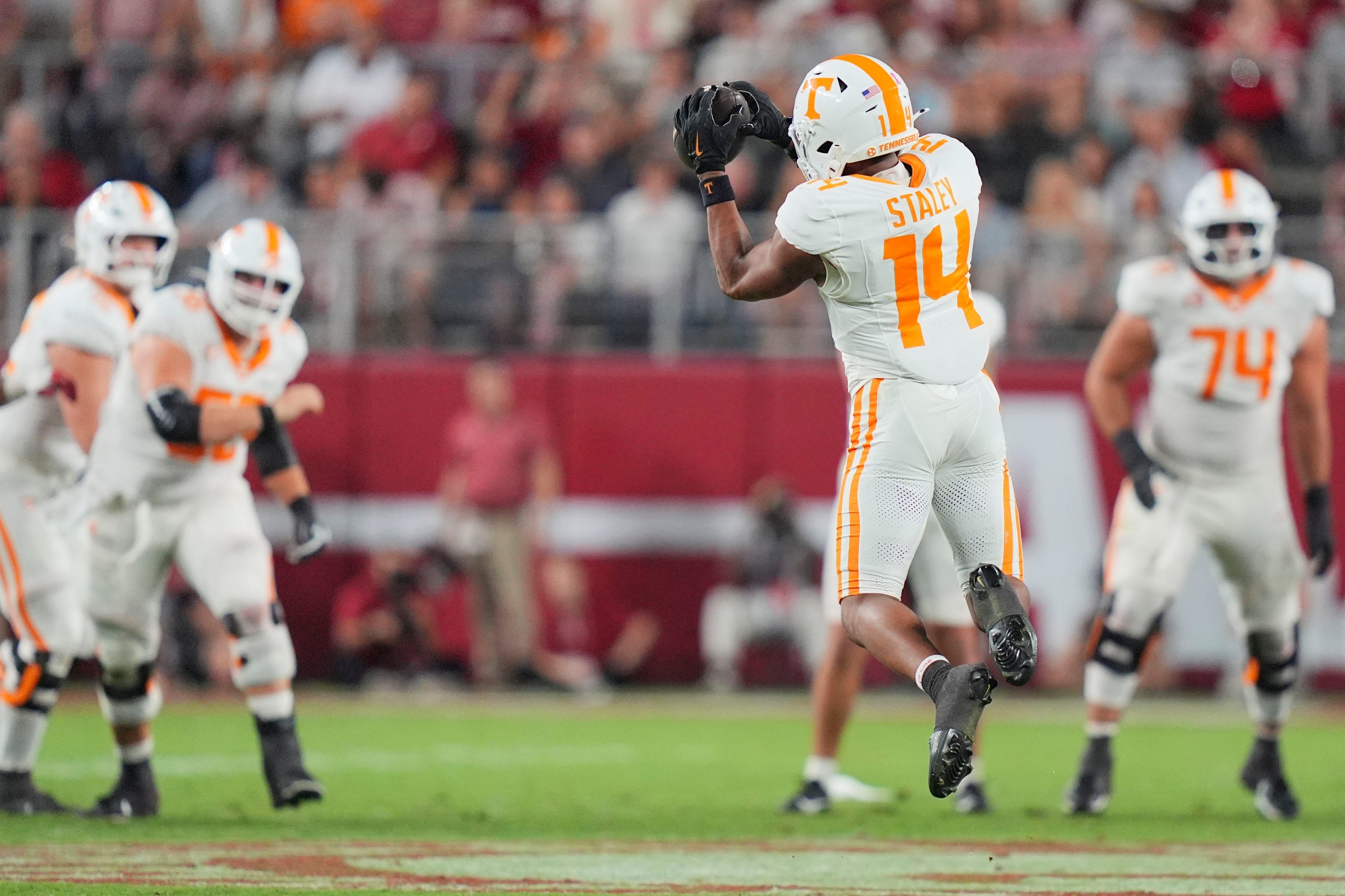 Tennessee wide receiver Braylon Staley (14) makes a catch during a college football game against Alabama at Bryant-Denny Stadium in Tuscaloosa, Ala., on Oct. 18, 2025.