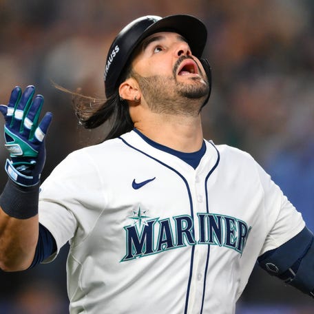 Eugenio Suarez celebrates his grand slam in the eighth inning of Game 5.