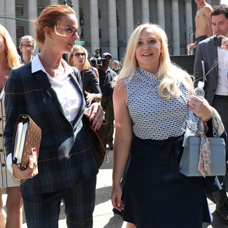 Virginia Giuffre, an alleged victim of Jeffrey Epstein, walks after the hearing in the criminal case against Epstein at Federal Court in New York, U.S., August 27, 2019.