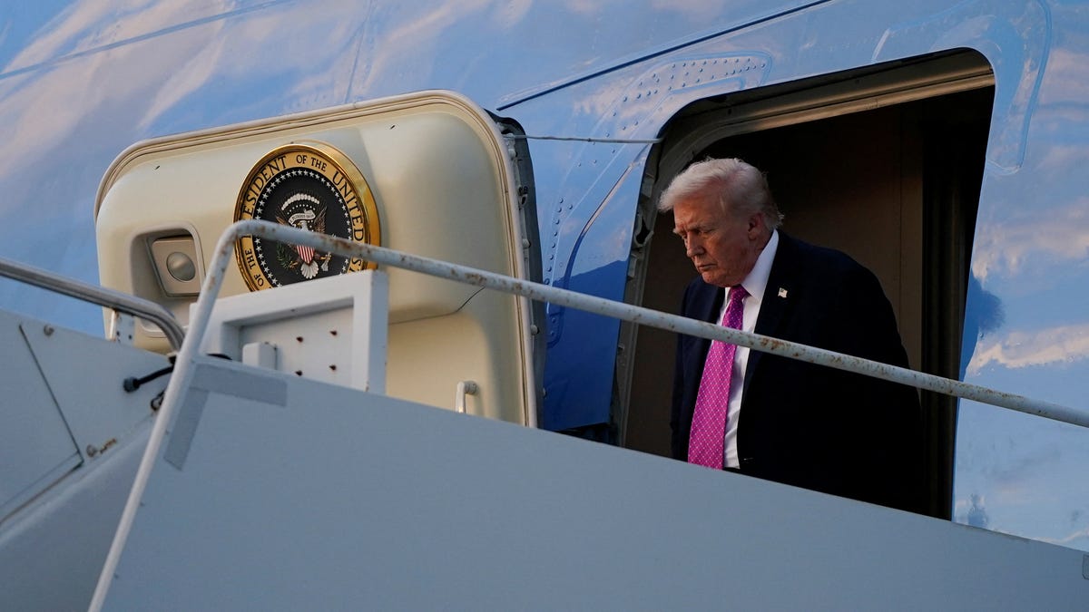 U.S. President Donald Trump disembarks Air Force One at Palm Beach International Airport, in West Palm Beach, Florida, U.S., Oct. 17, 2025.