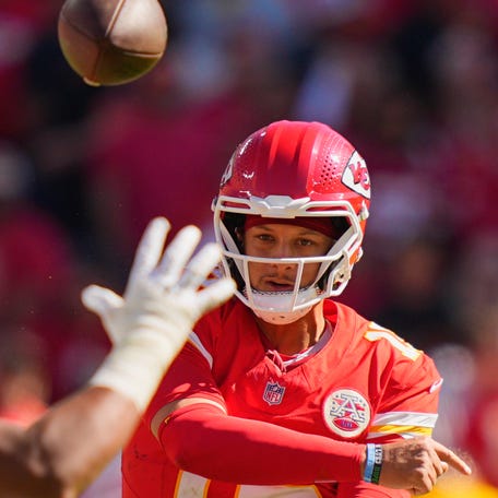 Oct 19, 2025; Kansas City, Missouri, USA; Kansas City Chiefs quarterback Patrick Mahomes (15) passes the ball against the Las Vegas Raiders during the second quarter of the game at GEHA Field at Arrowhead Stadium. Mandatory Credit: Jay Biggerstaff-Imagn Images