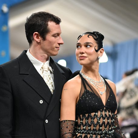 Dua Lipa and Callum Turner arrive for the 2025 Met Gala at the Metropolitan Museum of Art on May 5, 2025, in New York.