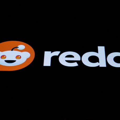 The company logo for Reddit is displayed on a screen on the floor at the New York Stock Exchange (NYSE) in New York City, U.S., May 15, 2024.