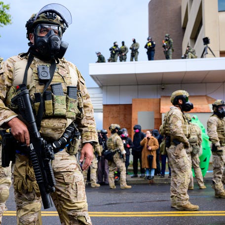 Federal agents clash with anti-I.C.E. protesters at the U.S. Immigration and Customs Enforcement building on October 12, 2025 in Portland, Oregon. An Instagram post from the WorldNakedBikeRidePortland account stated - "The emergency WNBR Portland is in response to the militarization of our peaceful city. Right now peaceful protesters are being brutalized as they do their best for our neighbors and cousins who are being kidnapped."