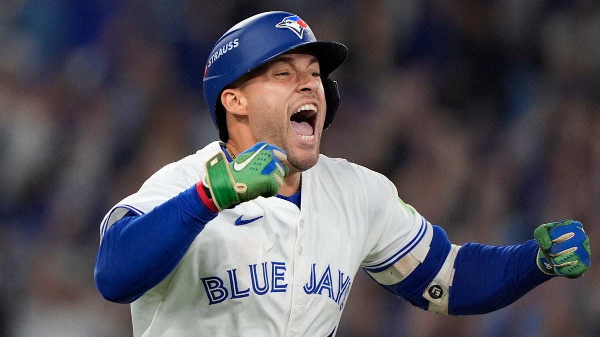 Oct 20, 2025; Toronto, Ontario, CAN; Toronto Blue Jays right fielder George Springer (4) celebrates after hitting a three run home run against the Seattle Mariners in the seventh inning during game seven of the ALCS round for the 2025 MLB playoffs at Rogers Centre. Mandatory Credit: John E. Sokolowski-Imagn Images