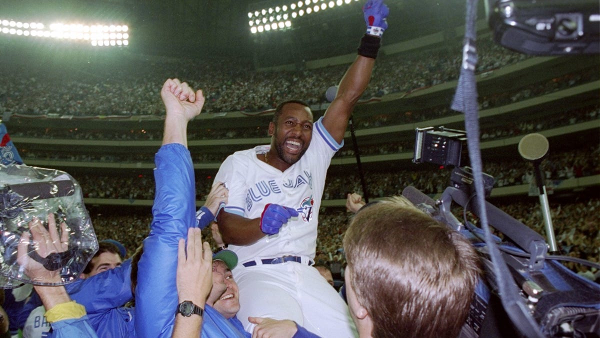 Joe Carter celebrates after winning the 1993 World Series.
