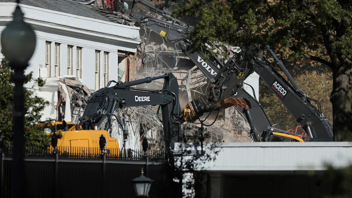 A demolition crew takes apart the facade of the East Wing of the White House, where President Donald Trump's proposed ballroom is being built, in Washington on Oct. 21, 2025.