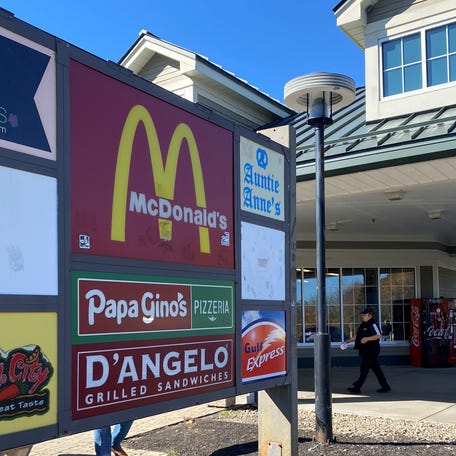 A sign lists the food choices available at the Charlton travel plaza on the westbound side of the Massachusetts Turnpike.