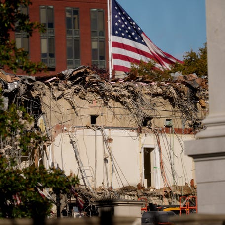 The facade of the East Wing of the White House is demolished by work crews on October 22, 2025 in Washington, DC. The demolition is part of U.S. President Donald Trump's plan to build a ballroom reportedly costing $250 million on the eastern side of the White House.