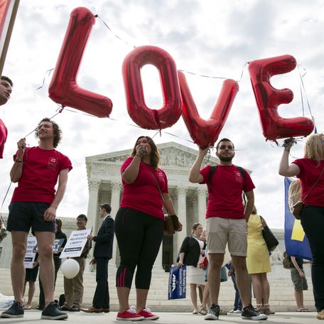 Supporters of gay marriage rally in front of the Supreme Court in Washington June 25, 2015.