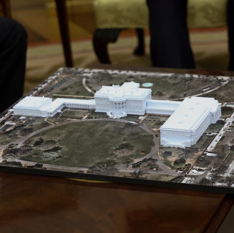 A model of the new White House ballroom in the to be renovated East Wing sits in the Oval Office on Oct. 22, 2025.