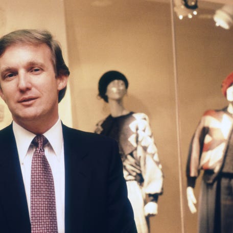 Real estate developer Donald Trump checks in on the last-minute construction of his 68-story Trump Tower in New York City on September 30, 1983.