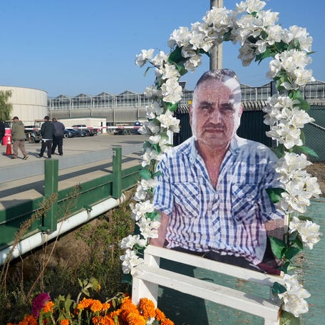 The entrance of Glass House Farms' cannabis facilities near Camarillo Oct. 27, 2025, displays a memorial to farmworker Jaime Alanís Garcia who died due to the July 10 immigration raid at the property.
