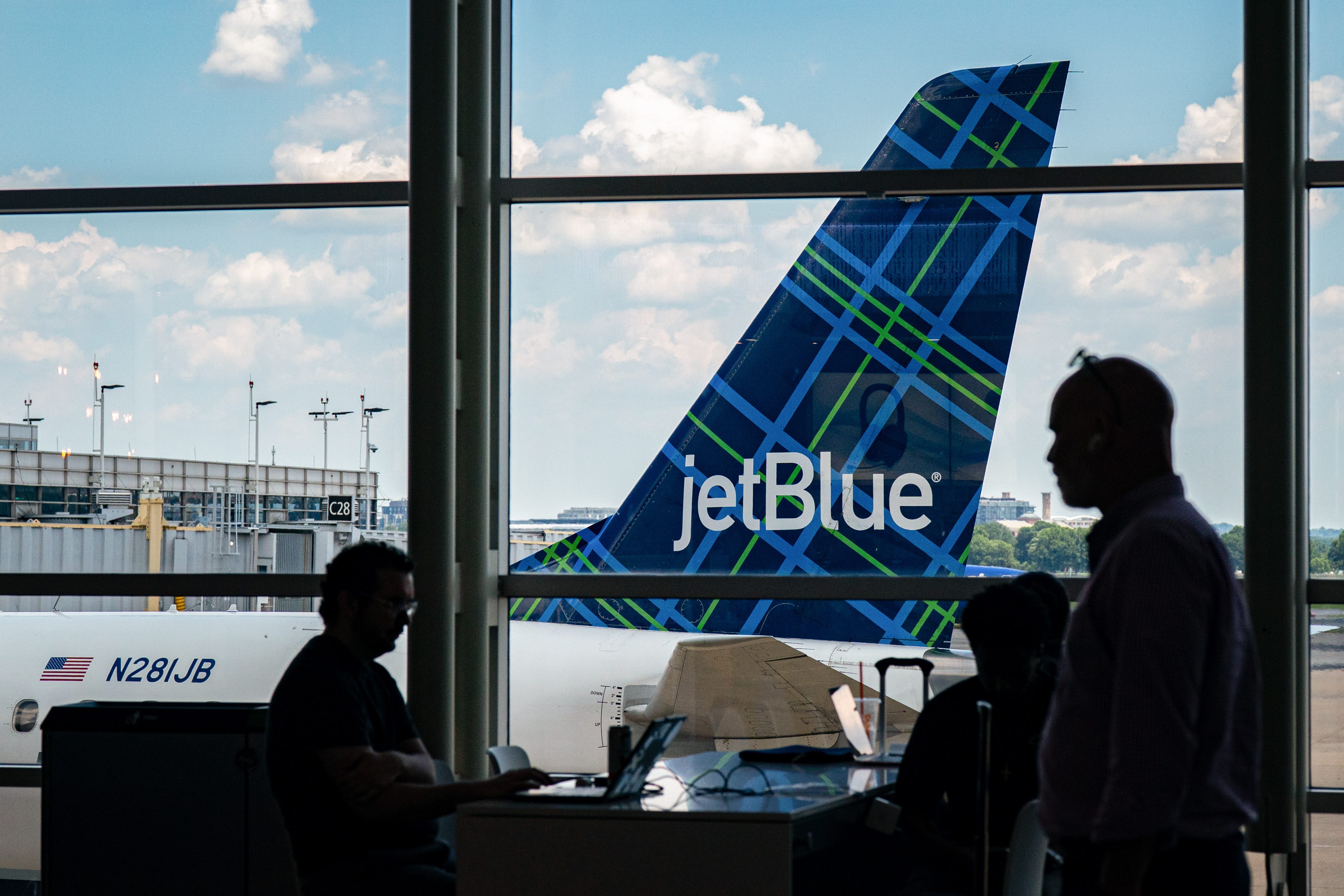 JetBlue falls as rising costs, hurricane dim travel rebound