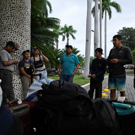 Tourists are evacuated from a hotel ahead of Hurricane Melissa's landfall, in Santiago de Cuba, Cuba, October 28, 2025.
