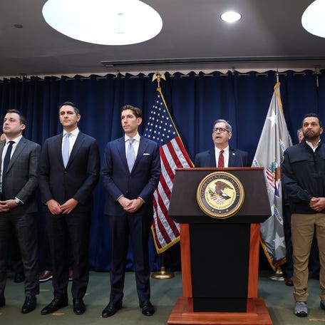 US Attorney for the Eastern District of New York Joseph Nocella (C) speaks alongside FBI Director Kash Patel (3R) during a news conference to announce arrests tied to alleged illegal sports betting and poker game schemes, in New York City on October 23, 2025.