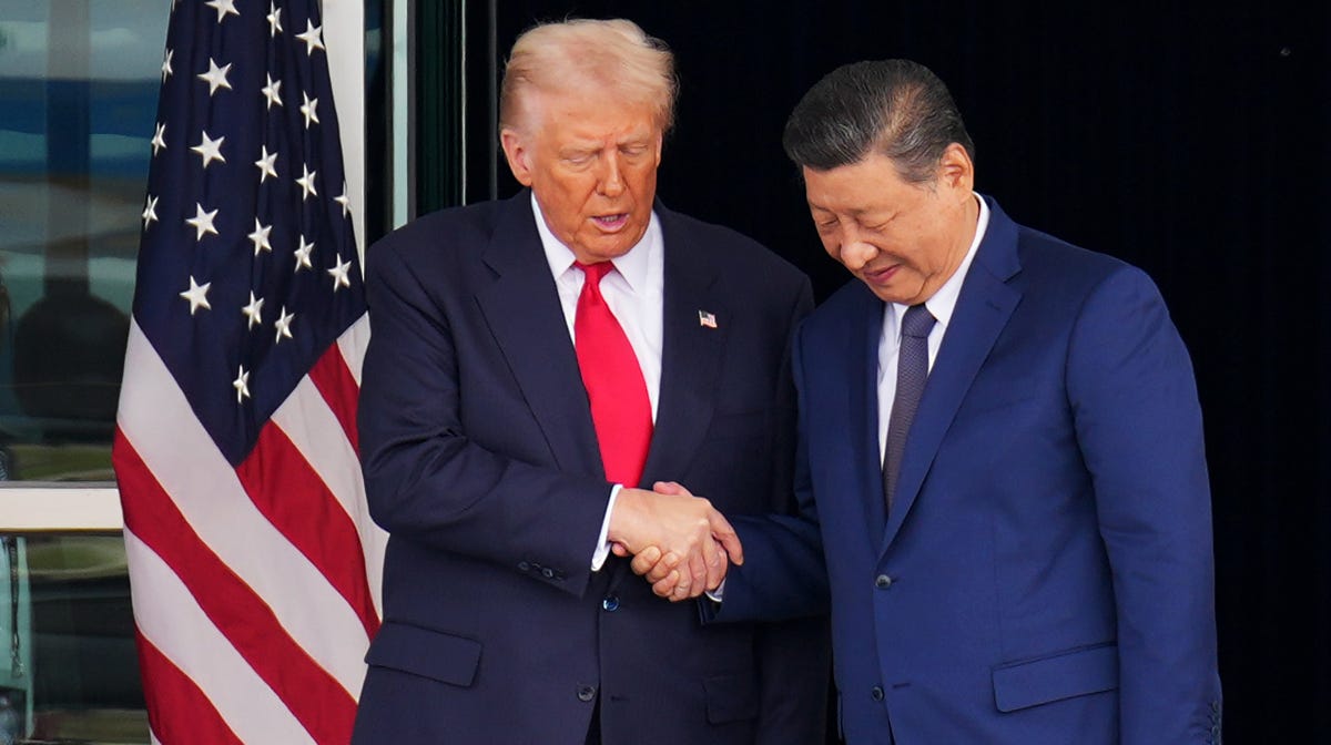 President Donald Trump and Chinese President Xi Jinping are pictured shaking hands as they depart following a bilateral meeting at Gimhae Air Base on Oct. 30, 2025, in Busan, South Korea.