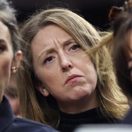 Casey Means, second from left, looks on as Robert F. Kennedy Jr., President Trump's nominee to be secretary of Health and Human Services, testifies before a Senate Finance Committee confirmation hearing on Capitol Hill in Washington, Jan. 29, 2025.