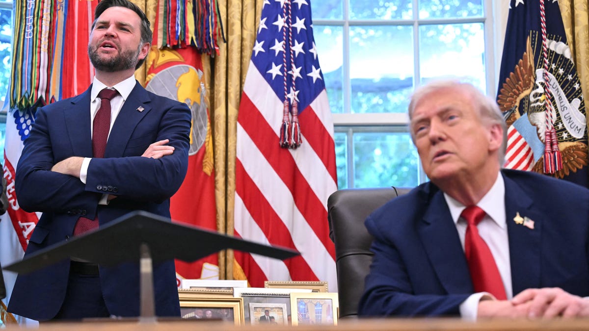 Vice President JD Vance and President Donald Trump speak to reporters in the Oval Office of the White House in Washington, DC, on Sept. 25, 2025.