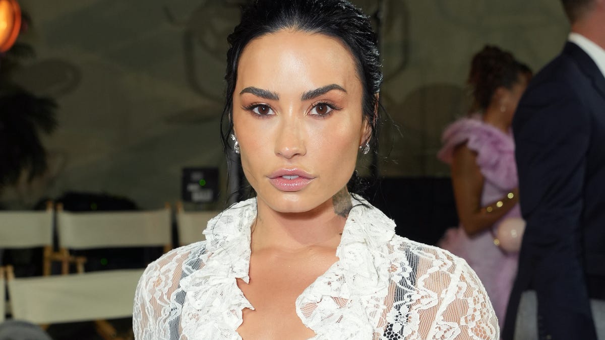 Demi Lovato lets viral alter ego Poot 'out of the basement' for campy Halloween look