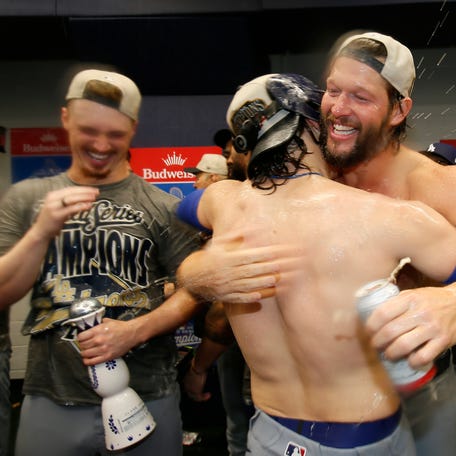Clayton Kershaw celebrates after winning Game 7.