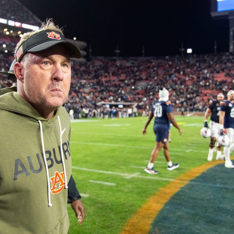 AUBURN, ALABAMA - NOVEMBER 01: Head coach Hugh Freeze of the Auburn Tigers walks on to the field after being defeated by the Kentucky Wildcats at Jordan-Hare Stadium on November 01, 2025 in Auburn, Alabama. (Photo by Michael Chang/Getty Images)