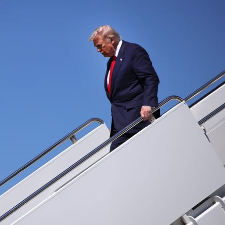 WEST PALM BEACH, FLORIDA - OCTOBER 31: President Donald Trump arrives at Palm Beach International Airport on October 31, 2025 in West Palm Beach, Florida. Trump is spending the weekend at his Mar-A-Lago estate in Palm Beach, Florida. (Photo by Samuel Corum/Getty Images)