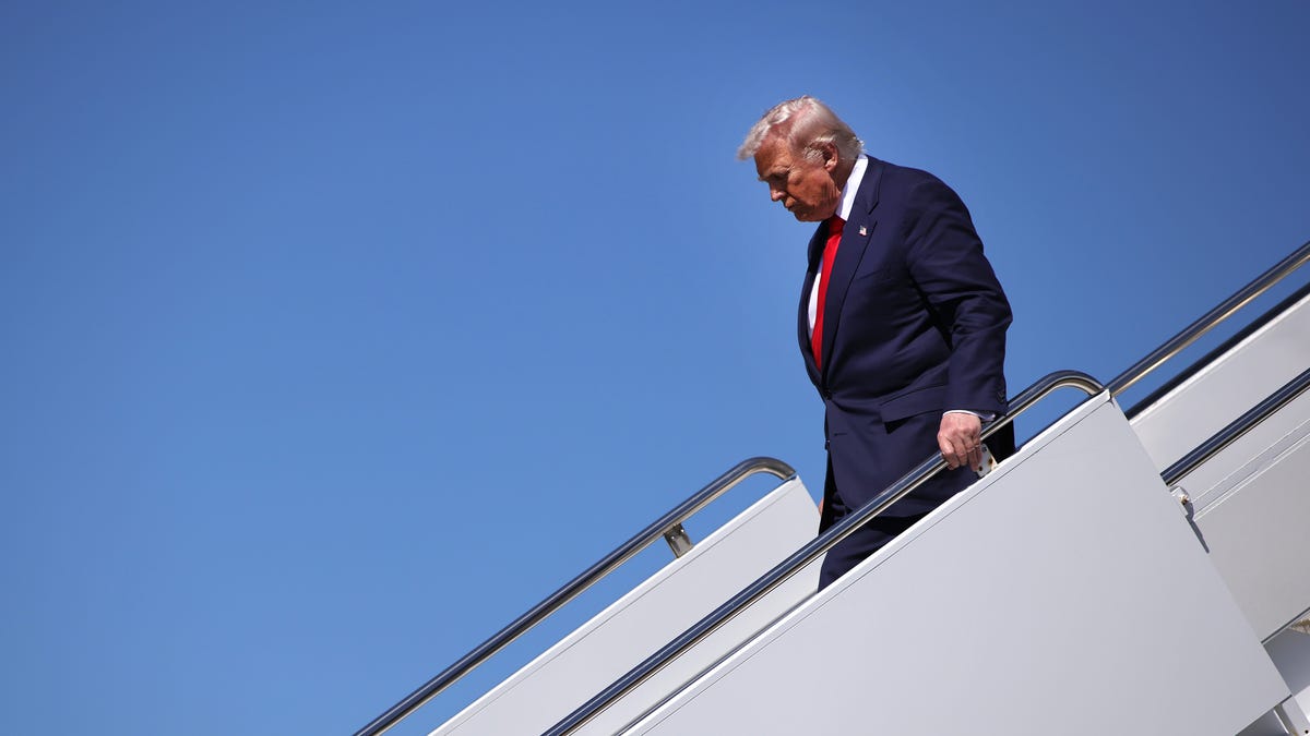 WEST PALM BEACH, FLORIDA - OCTOBER 31: President Donald Trump arrives at Palm Beach International Airport on October 31, 2025 in West Palm Beach, Florida. Trump is spending the weekend at his Mar-A-Lago estate in Palm Beach, Florida. (Photo by Samuel Corum/Getty Images)