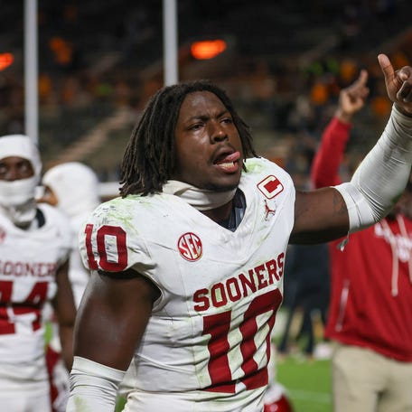 Oklahoma linebacker Kip Lewis (10) celebrates after his team's defeat of Tennessee at Neyland Stadium.