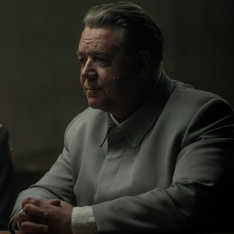 Army psychiatrist Douglas Kelly (Rami Malek, left) and Nazi leader Hermann Göring (Russell Crowe) match wits in "Nuremberg."