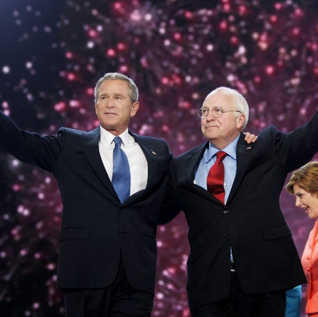 U.S. President George W. Bush and Vice President Dick Cheney celebrate at the conclusion of the 2004 Republican National Convention at Madison Square Garden in New York on Sept. 2, 2004.