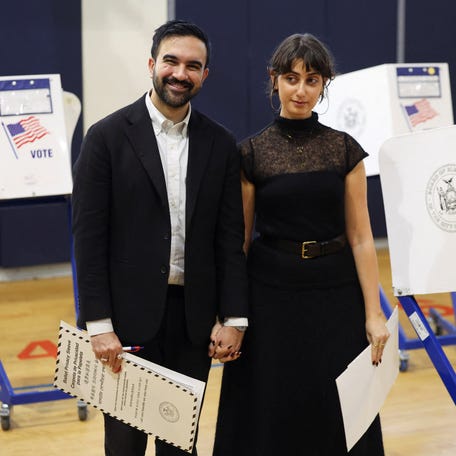 The Democratic nominee for New York City mayor, Zohran Mamdani, and his wife, Rama Duwaji vote in Astoria on Nov. 4, 2025.