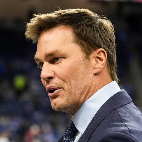 Tom Brady waves at Detroit Lions fans at Ford Field in Detroit on Nov. 2, 2025.