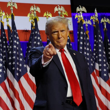 Republican presidential nominee and former U.S. President Donald Trump takes the stage to address supporters at his rally, at the Palm Beach County Convention Center in West Palm Beach, Florida, U.S., November 6, 2024.