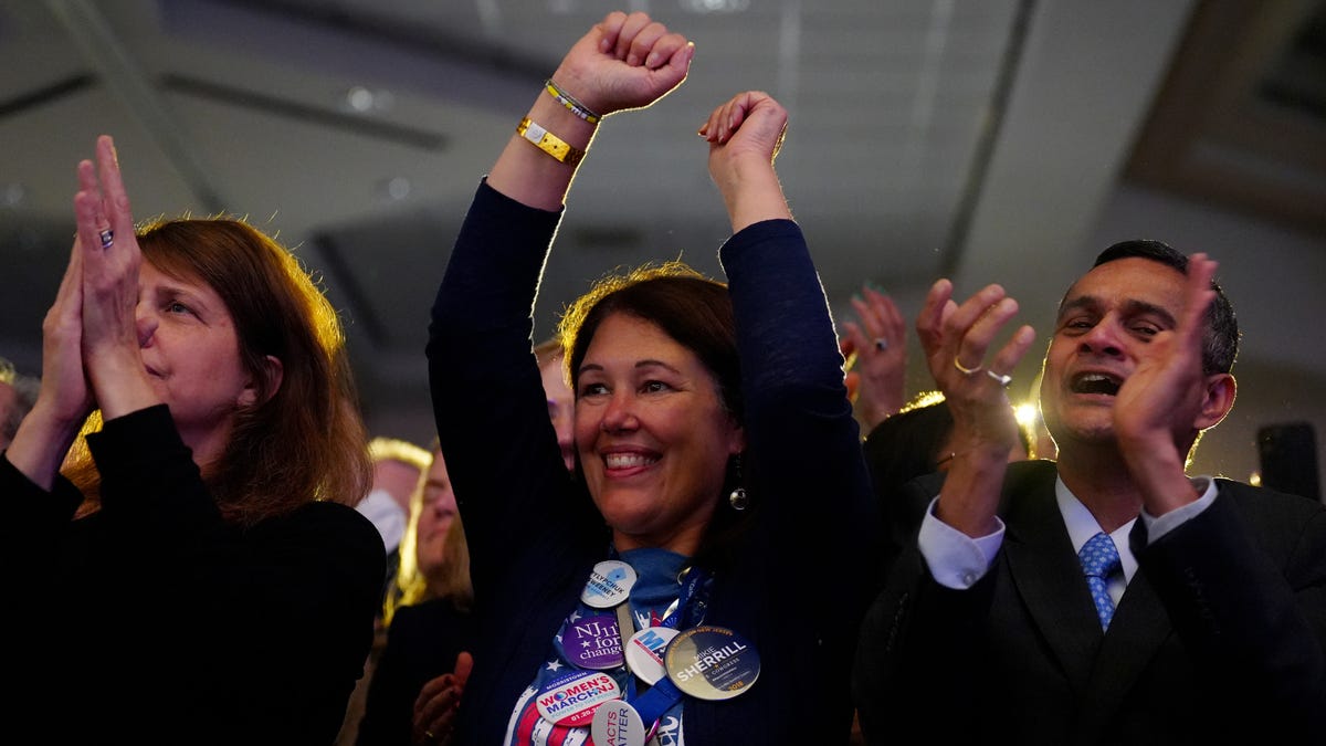 Maria Slabaugh, of Morristown, and other Mike Sherrill supporters cheer at a watch party for the gubernatorial candidat on Nov. 4, 2025, in East Brunswick.